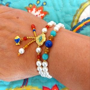 All 3 items for 1 price;  2 Bracelets, 1 Charm/ Pendant